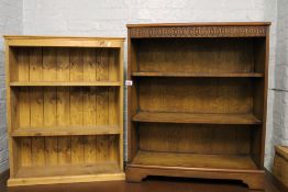 Two early 20th Century bookcases: 1 oak measuring 97.5cm h x 82cm w x 34cm deep together with one