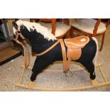 A vintage free-standing rocking horse: max height 77cm.
