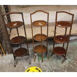 Three early 20th century folding oak/mahogany cake stands (3).