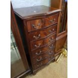 Flame mahogany chest of 6 drawers: raised on bracket feet, 49cm wide.