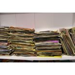 A collection of 45 rpm singles 1960's/1970's/1980's mixed genres: viewing advised.