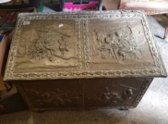 A Large Embossed Brass covered Log Box: with Tavern Scenes, 80cm wide, 45cm deep x 58cm high, in