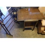 1940's metamorphic oak tea trolley/table: together with a mahogany towel rail.