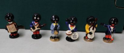 Carlton Ware small Golly band: to include Bass, Guitar, Saxophone, Conductor, Drummer, Accordion.