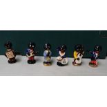 Carlton Ware small Golly band: to include Bass, Guitar, Saxophone, Conductor, Drummer, Accordion.