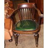 Oak Captains chair: on turned tapered legs, green leather seat. 67cm wide