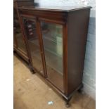 Glazed china display cabinet with glass shelves: raised on cabriole front supports, 92cm wide.