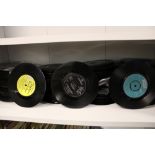 A collection of 45 rpm singles 1960's/1970's/1980's mixed genres: viewing advised.