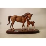 Royal Doulton First Born: on wooden plinth