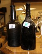 Two Large Early Hand Blown Glass Bottles: height of tallest 26cm(2)