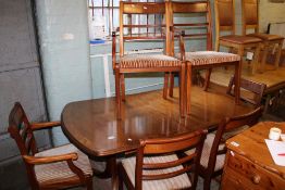 Parker Knoll extending dining table + 6 chairs: (2 carvers + 4 dining chairs), table un-extended