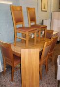 Modern, quality extending dining table and 6 chairs: honey oak finish, table extends to 190cm.