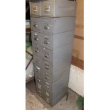 A metal filing cabinet: 131cm x 40cm x 39cm together with a single filing cabinet