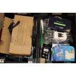 A collection of Amazon returned items including: electrical items, hubs, dash cam, speakers, ear