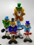 Four Murano clown glass figures: Height of tallest 36cm