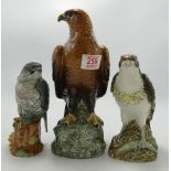 Beswick bird whisky flasks to include: Eagle 2678, Osprey 2583 ( Full) and Peregrine Falcon 2642 (3)