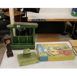 A collection of vintage items: shoe shine box/boot jack, miniature grandfather clock, onyx ink well,