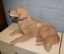 A large resin figure of a Golden Retriever: 61cm in length.