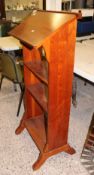 A 20th Century Mahogany lectern: height 124cm.