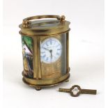 Small Carriage Clock with porcelain panels: Elliott & Son London, with key, 9cm in height approx.