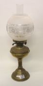 Vintage brass oil lamp: with shade and chimney, height 58cm.
