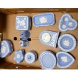 A collection of Wedgwood Jasperware to include: bells, lidded pots, clocks ash trays pin trays