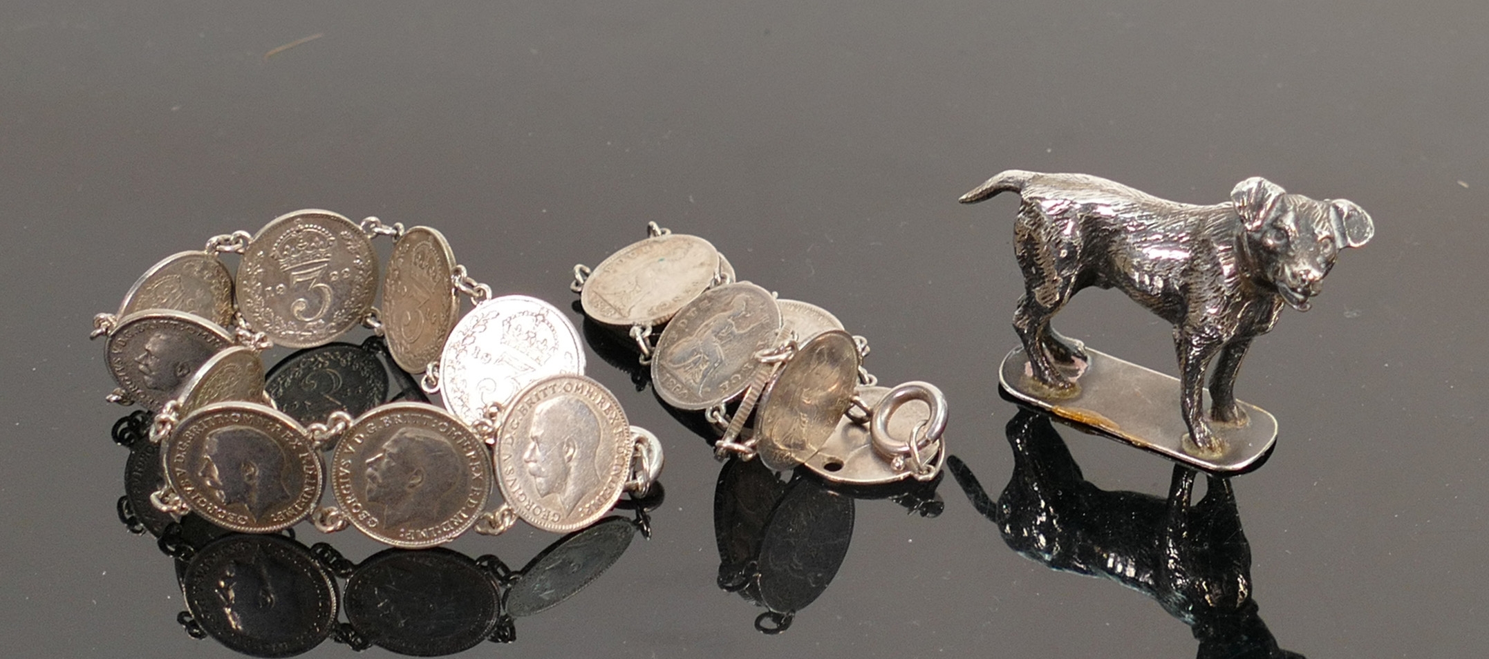 Hallmarked silver dog & 2 x silver 3d & 4d coin bracelets: Dog weighs 23.5g, the bracelets
