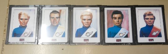 A collection of Gerry Anderson framed Tracy Brother prints: (5)