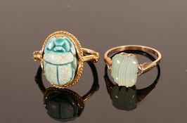 Two gold rings: One 9ct set with onyx or similar, the other set with a scarab and un-hallmarked, but