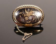 Pique a jour tortoiseshell gold & silver inlaid brooch: Measures 41mm wide appx. Bird and floral