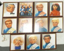 A collection of 11 Framed Prints Of Thunderbirds Characters: each 28 x 24cm