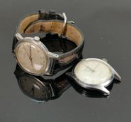 Two Garrard mid century stainless steel gents watches: Watch with strap in manual wind and has ICI