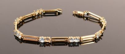 9ct gold tennis bracelet set with aqua stones, 9.3g: