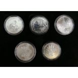 A collection of cased proof silver coins: including 20 Krugerrand, Canadian silver $5 coin, US £1