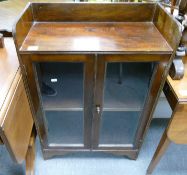 Small Glazed Dark Wood Bookcase: height 92cm, width 61cm & depth 31cm