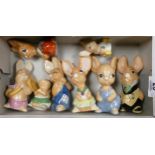 A collection of Carltonware Pendelfin hand painted pottery figures: (8)