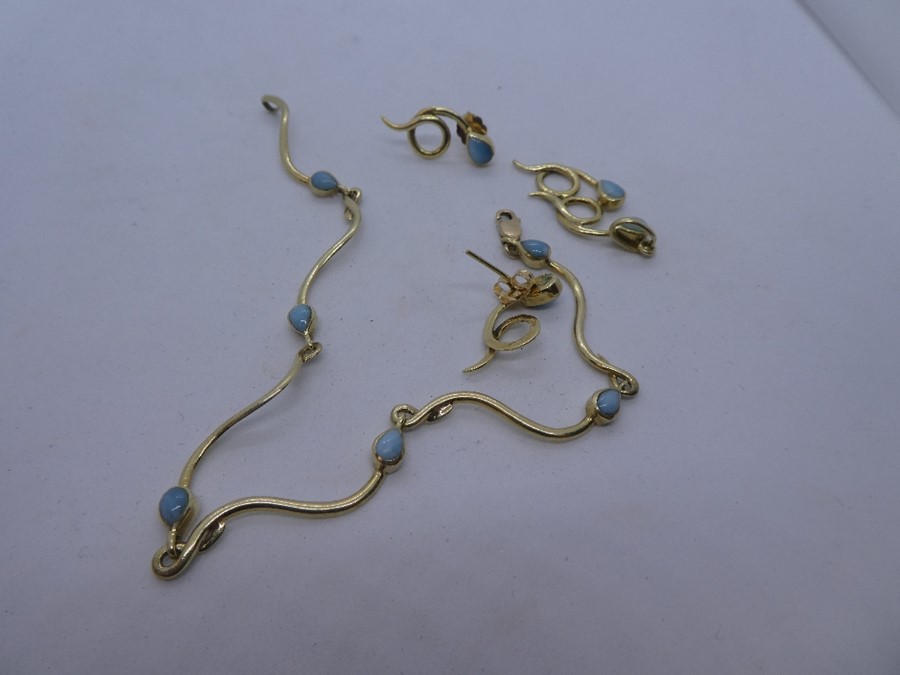 14K Yellow gold 'S' design bracelet set with pale blue stones reputed to be larimar, together with a - Image 5 of 5
