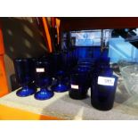 Quantity of blue glass drinking vessels and 5 cut glass fruit bowls