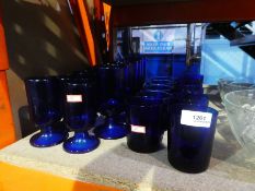 Quantity of blue glass drinking vessels and 5 cut glass fruit bowls