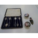 A silver lot comprising of a set of six silver Apostle spoons with matching sugar tongs. Hallmarked