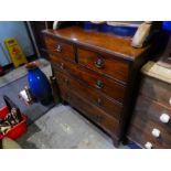 Mahogany chest of two short drawers over three long with bracket supports