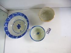 Small blue and white oriental, possibly Chinese, dish decorated with a village scene, blue and white