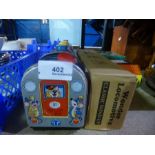 A Japanese tinplate toy train, boxed Wonder locomotive, tinplate garage etc