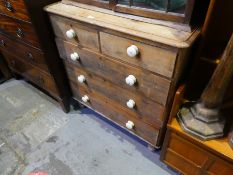 Vintage stripped pine chest of 2 over 3 long drawers on turned supports