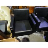 Pair of contemporary faux leather barber chairs on square chrome supports