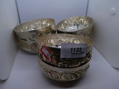 Set of 6 silver bowls, stamped silver possibly of Indian origin and of embossed design - weight appr