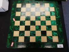 Hardstone green and cream chess board and a set of chess pieces