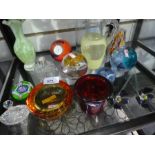 Shelf of mixed glassware incl. Caithness paperweights, Whitefriars style amber bowls etc