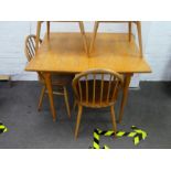 Vintage teak extending dining tables and a set 4 blonde hoop and stick back kitchen chairs by Ercol