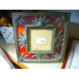 Red stained glass photograph frame decorated withsunflowers and a small box of brass items to incl.